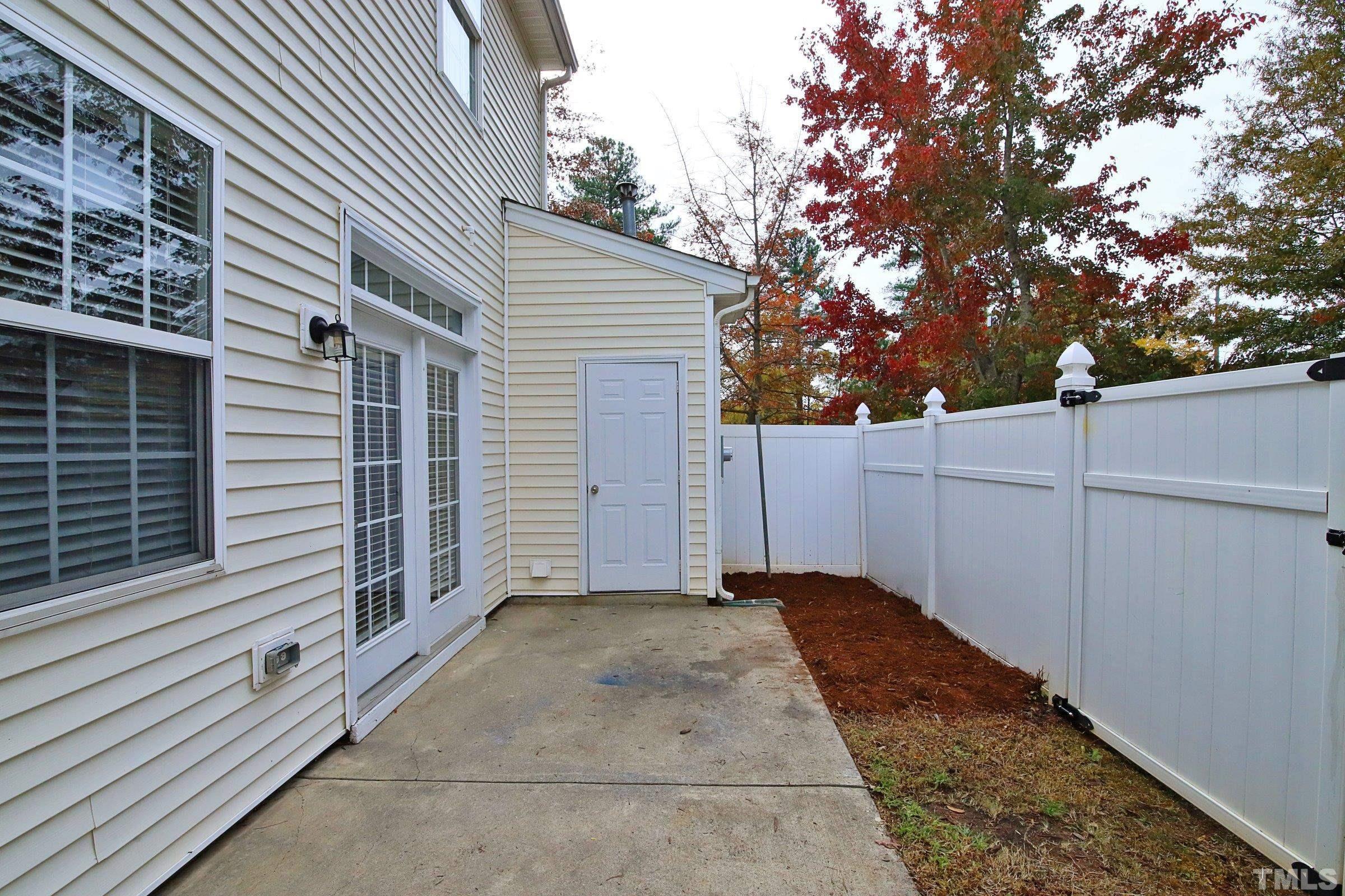 8205 Martello Lane Raleigh, NC 27613 - Photo 27 of 28 a view of a backyard