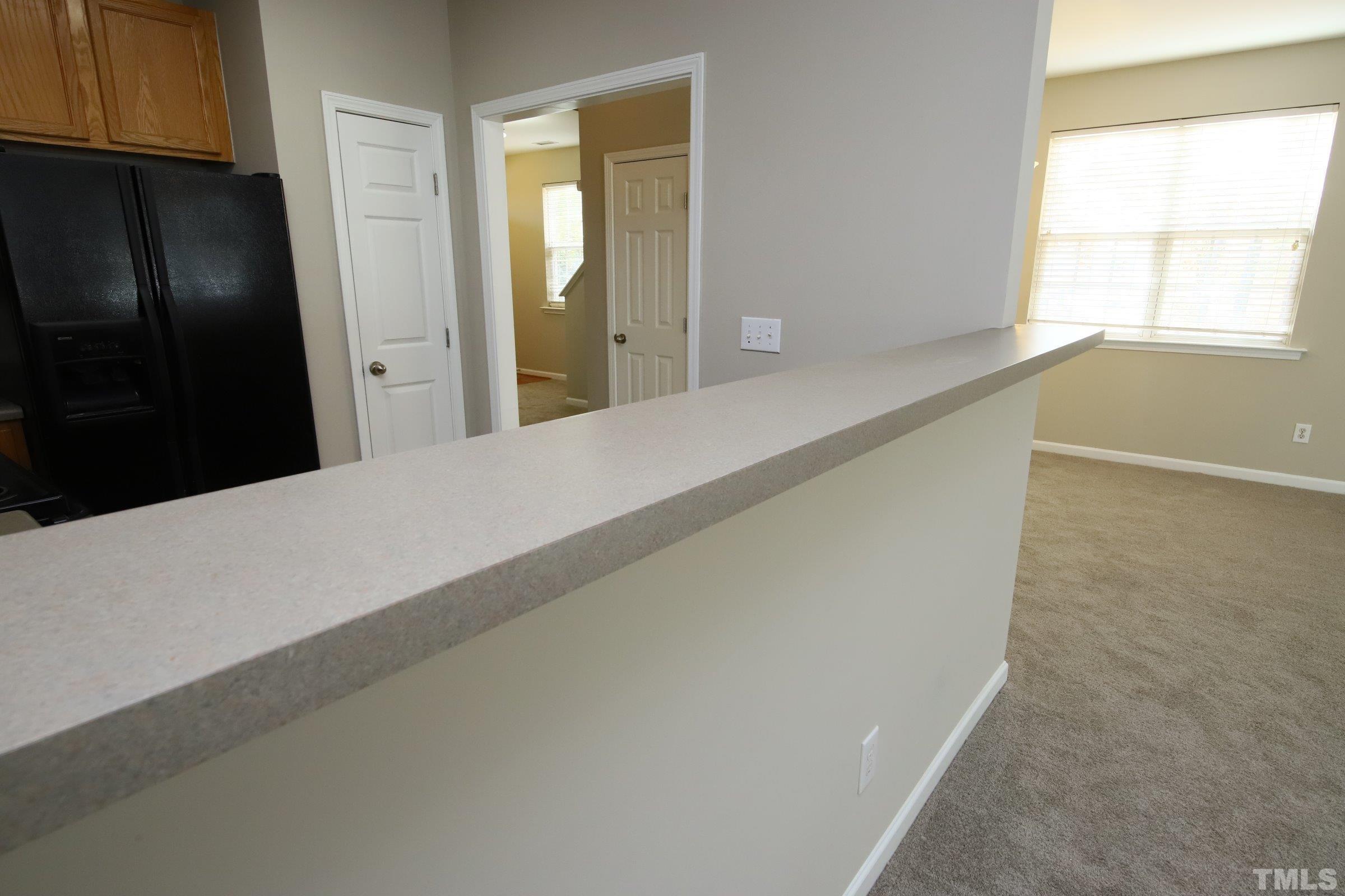 8205 Martello Lane Raleigh, NC 27613 - Photo 6 of 28 a view of an empty room and window