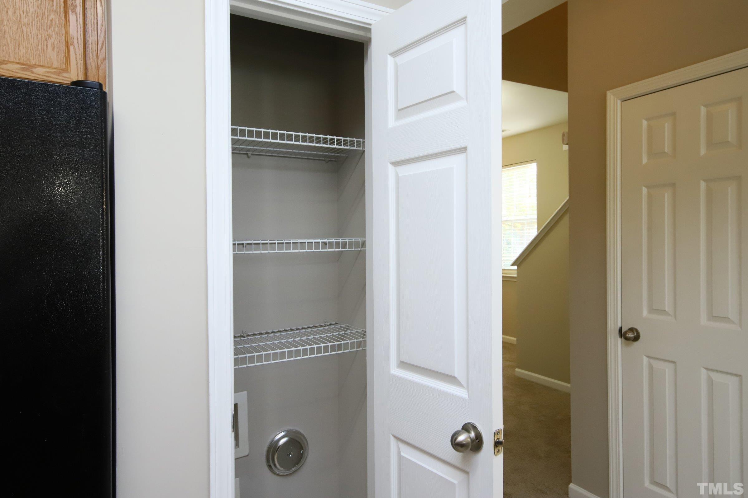 8205 Martello Lane Raleigh, NC 27613 - Photo 7 of 28 a bathroom with a glass shower door