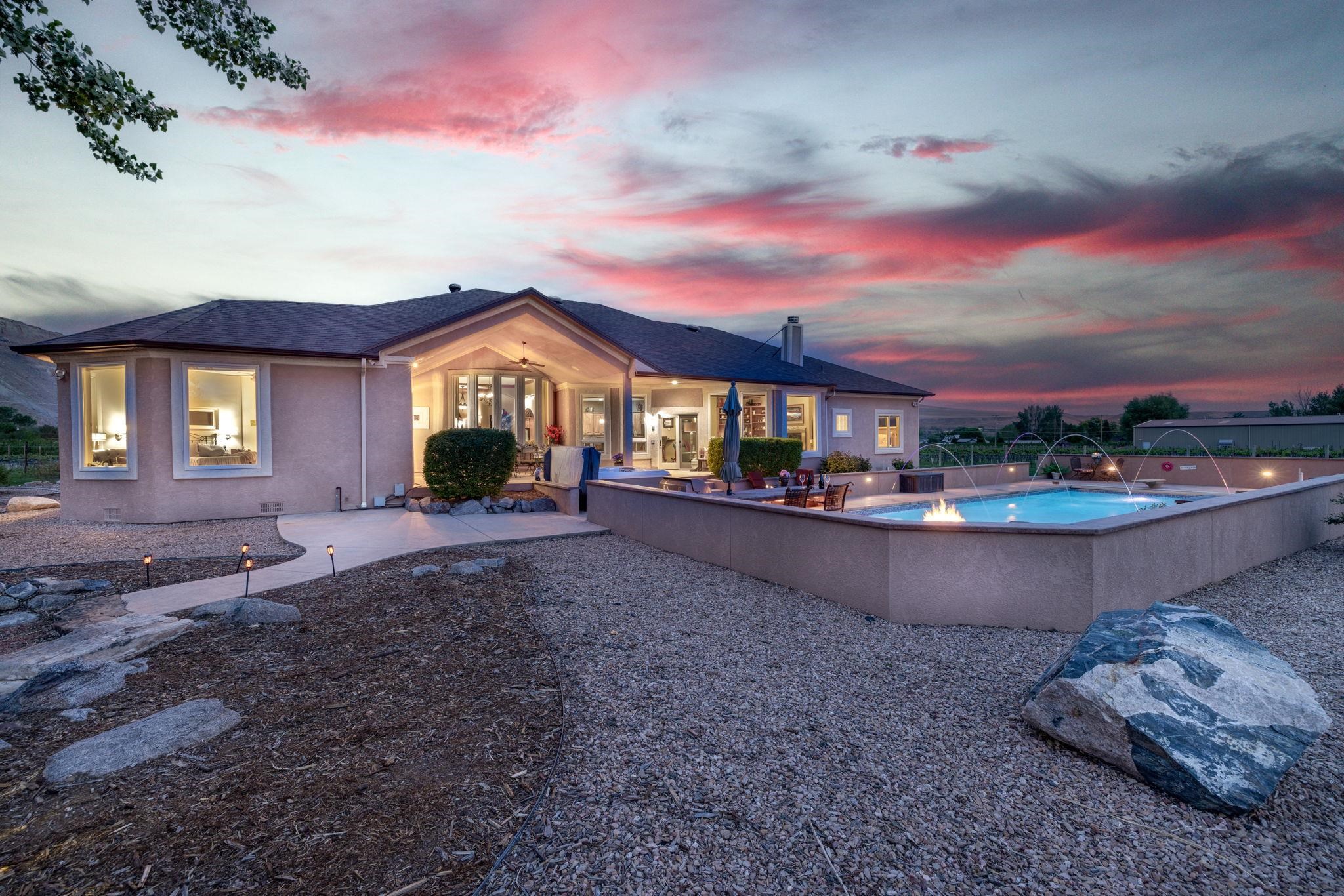 759-36 36 3/10 Road Palisade, CO 81526 - Photo 4 of 39 a front view of a house with a yard