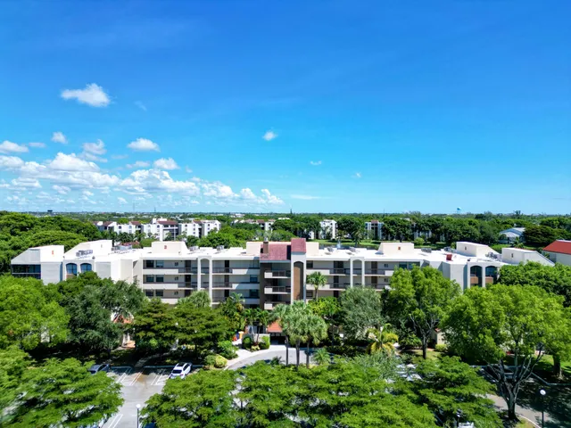 a view of a bathroom with wooden floor