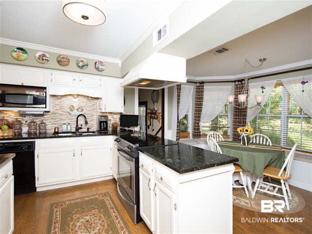640 Spanish Main Spanish Fort, AL 36527 - Photo 12 of 33 Breakfast area with bay window adjoin this great kitchen.