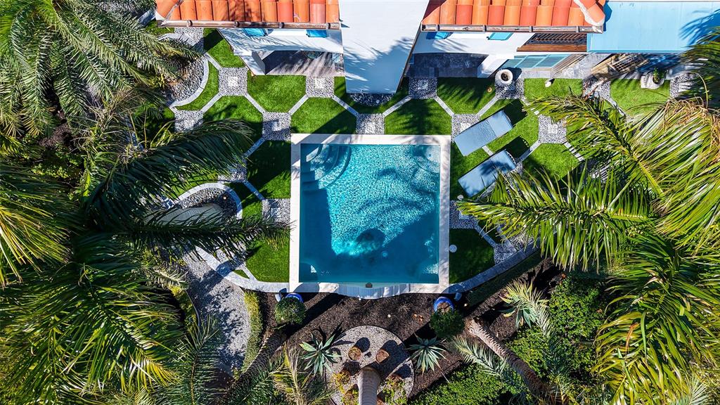 513 Villa Rosa Way Anna Maria, FL 34216 - Photo 22 of 57 a view of a plant in a garden