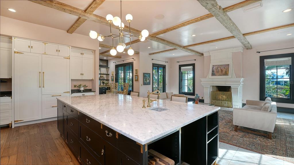 513 Villa Rosa Way Anna Maria, FL 34216 - Photo 50 of 57 a view of kitchen island a sink and living room