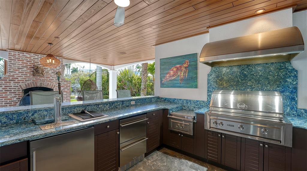 513 Villa Rosa Way Anna Maria, FL 34216 - Photo 53 of 57 a kitchen with a stove and a sink