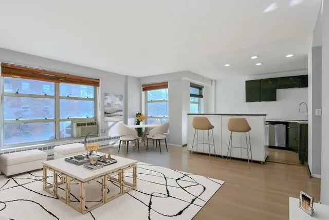 a picture of a wall with a white wall and a picture