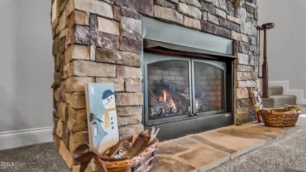 a bedroom with a bed and a mirror