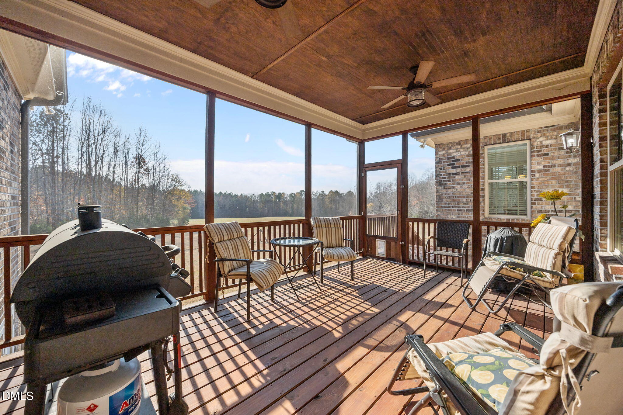 868 Julie McKnight Road Kittrell, NC 27544 - Photo 17 of 54 a living room with a large bed and a large window with outer view
