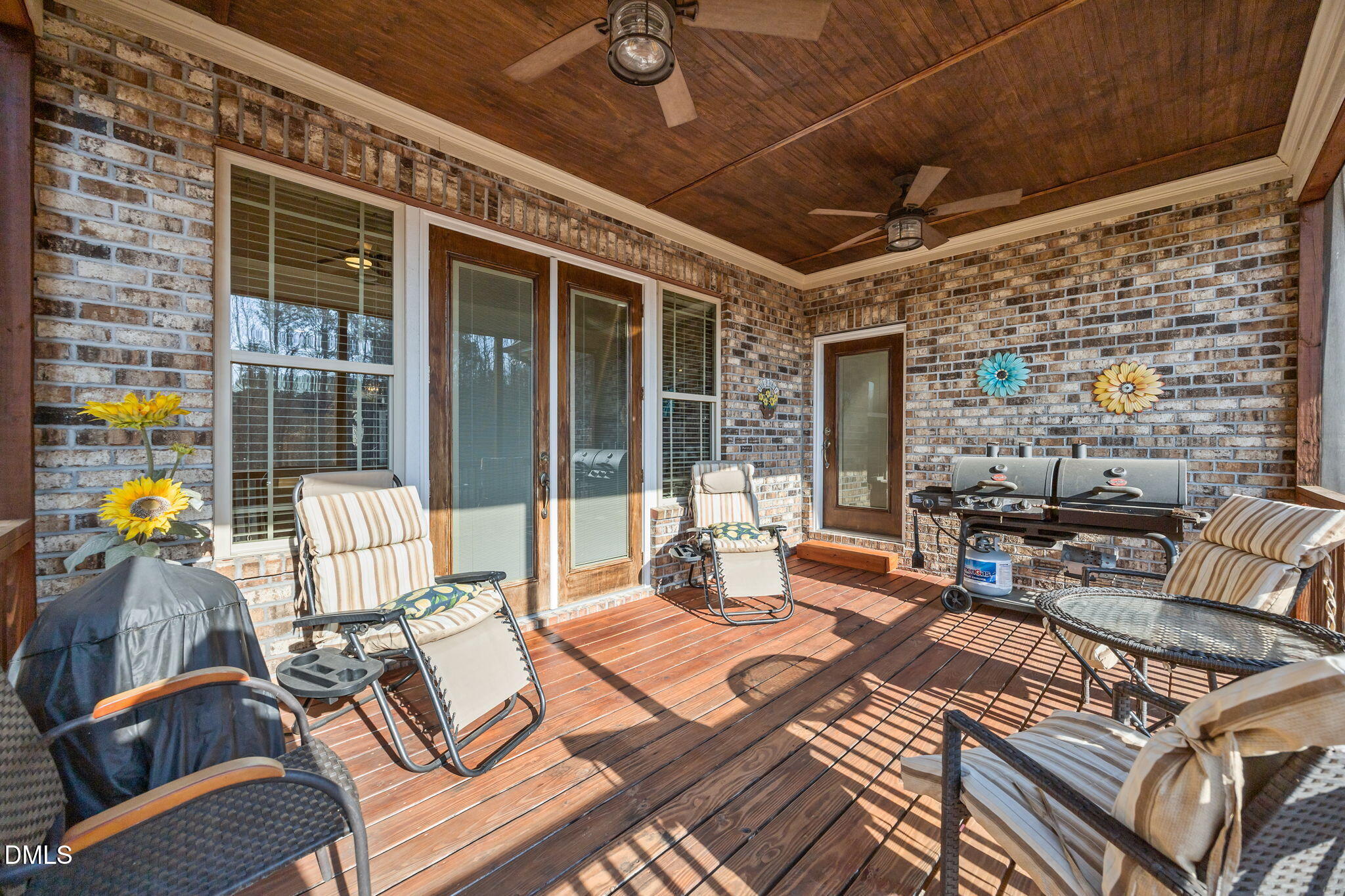 868 Julie McKnight Road Kittrell, NC 27544 - Photo 18 of 54 a outdoor space with patio the couches and a dining table with the view of the front door