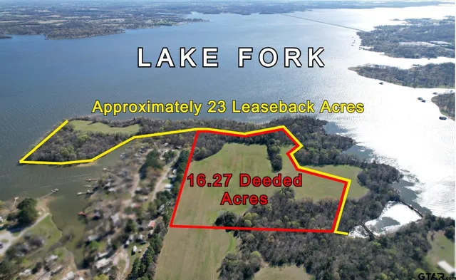 an aerial view of a house with a outdoor space