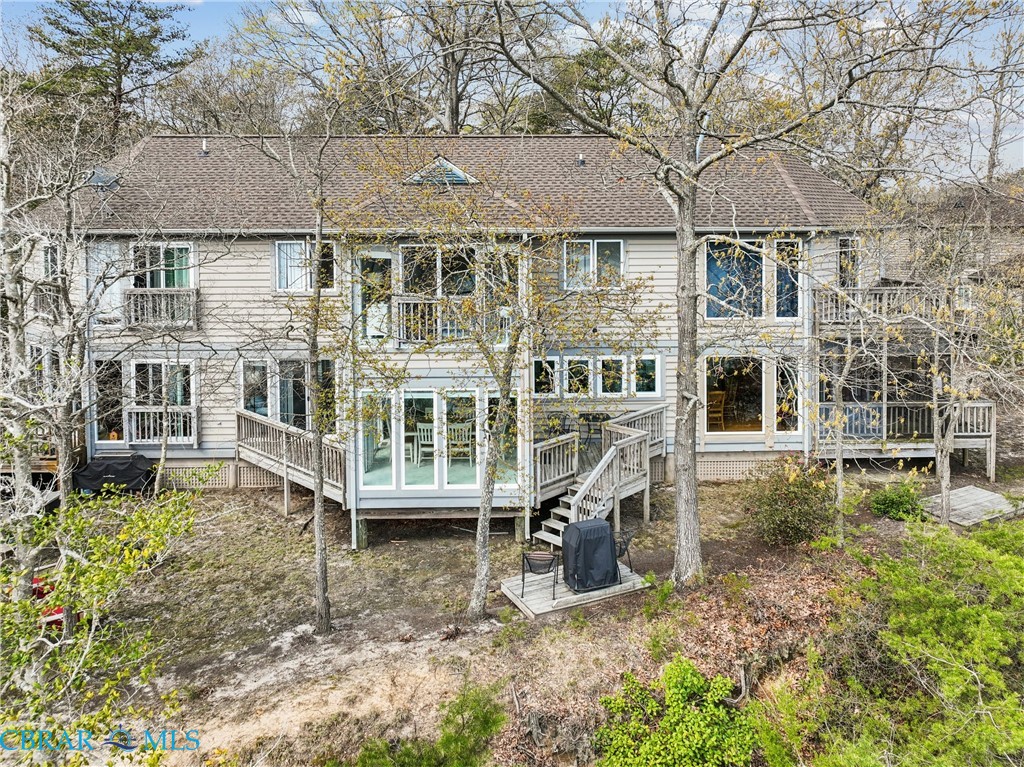 172 Sturgeon Creek Road Deltaville, VA 23043 - Photo 47 of 50 Back of house featuring a wooden deck and a balcony