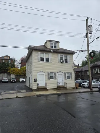 a view of a street with cars