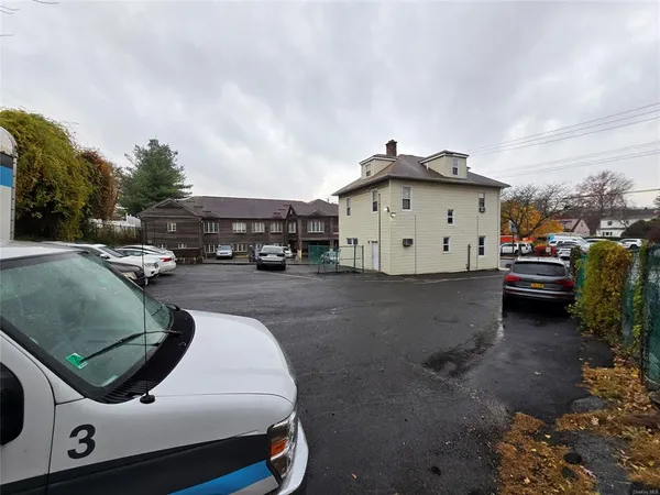 a car parked in front of a house