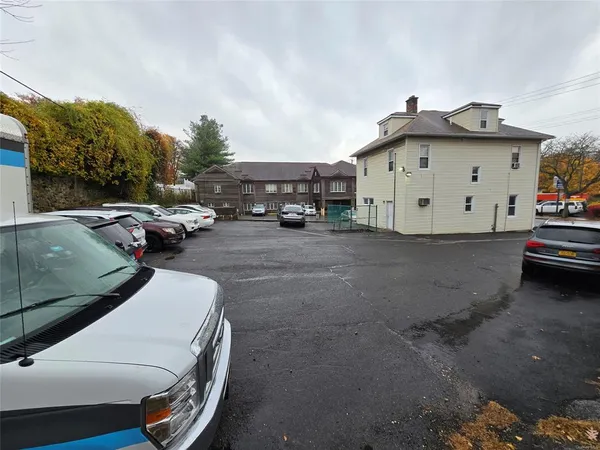 a view of a street with cars