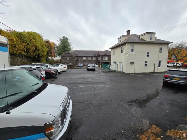 a view of a street with cars