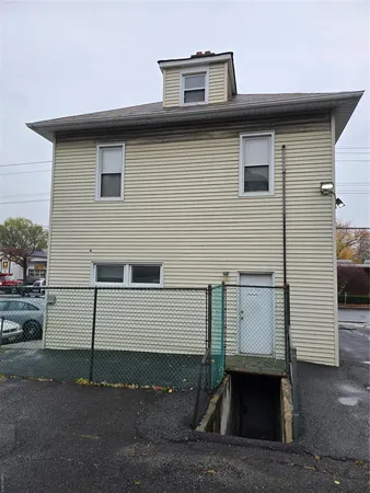 a front view of a house with stairs