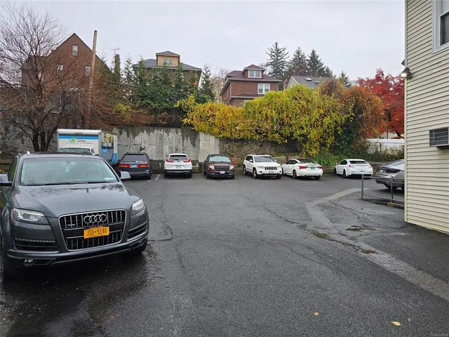 a car parked in front of a house