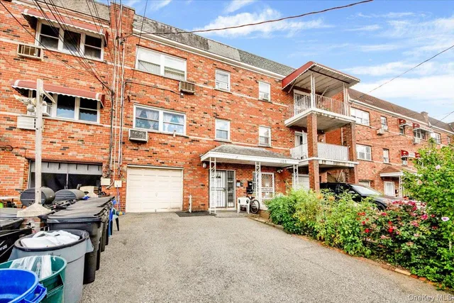 a view of a building with sitting area