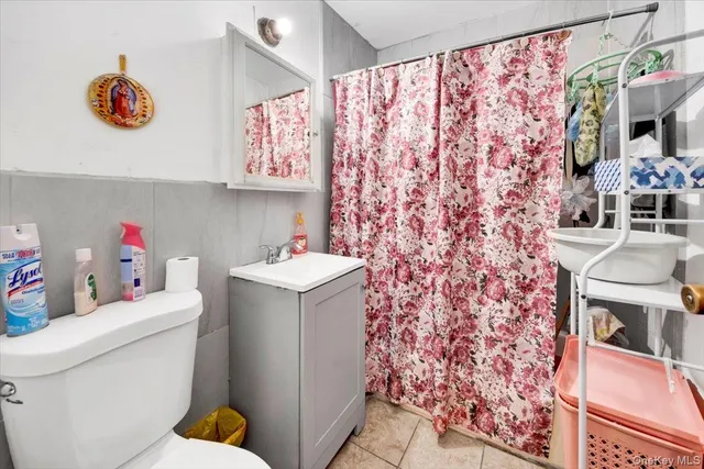 a bathroom with a sink and a washing machine