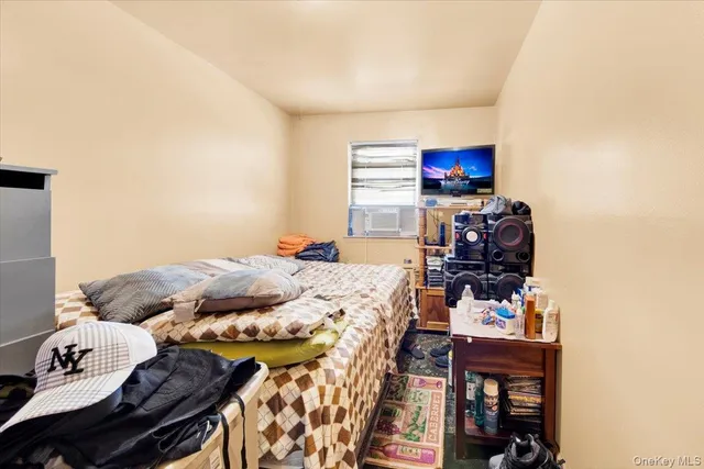 a bedroom with a bed and furniture