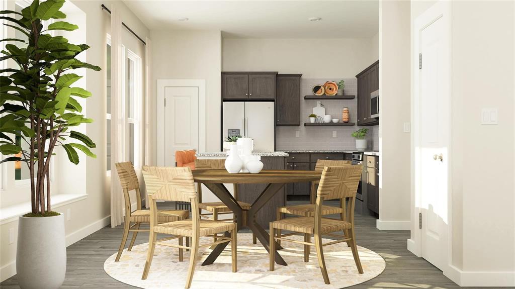 4303 Stonybrook Road Arlington, TX 76005 - Photo 3 of 18 a view of a dining room with furniture and a potted plant