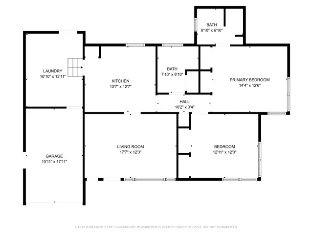 a house with a yard in front of it