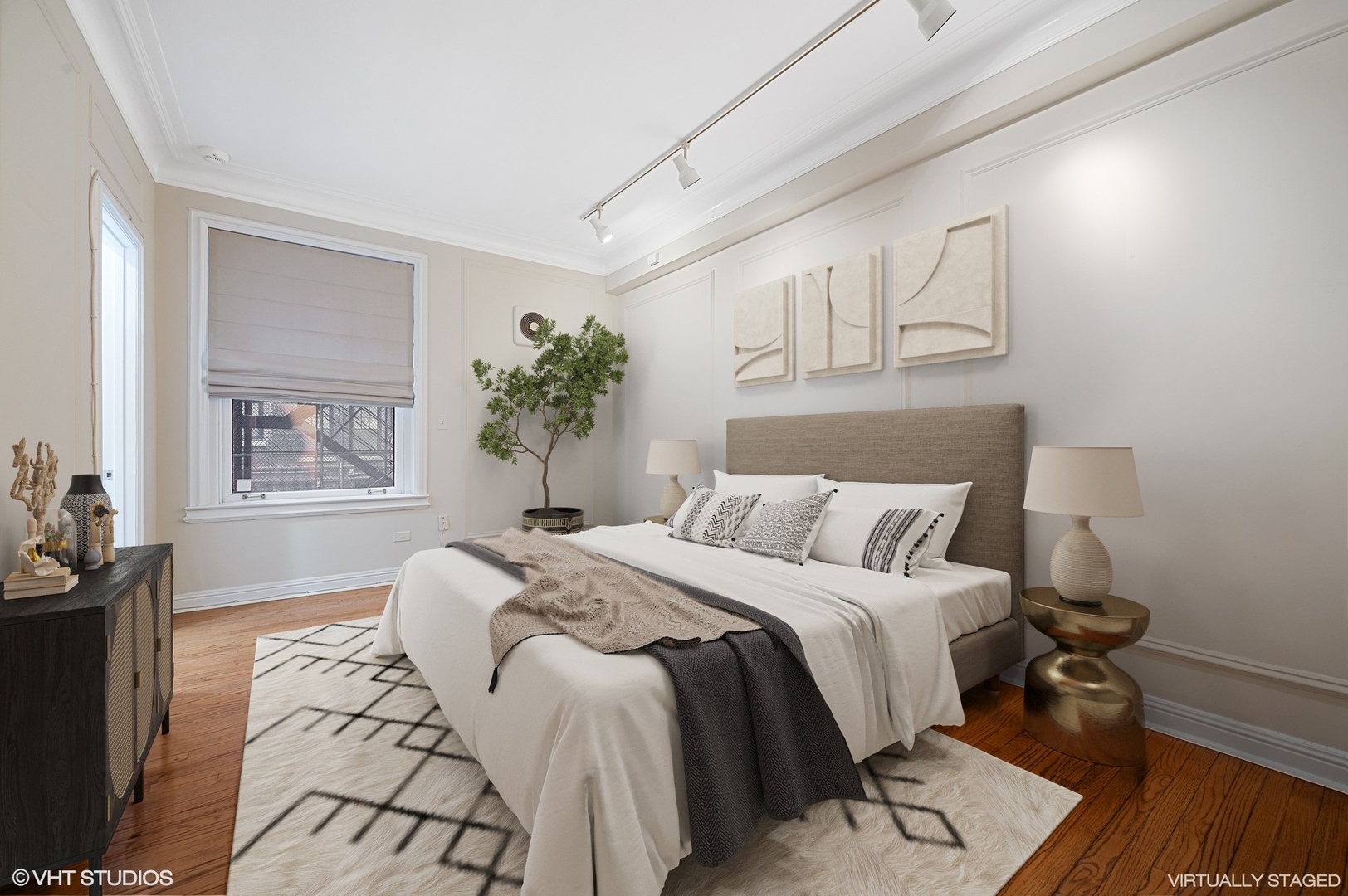 237 East Delaware Place, Unit 2A Chicago, IL 60611 - Photo 13 of 19 a bedroom with a large bed and a window