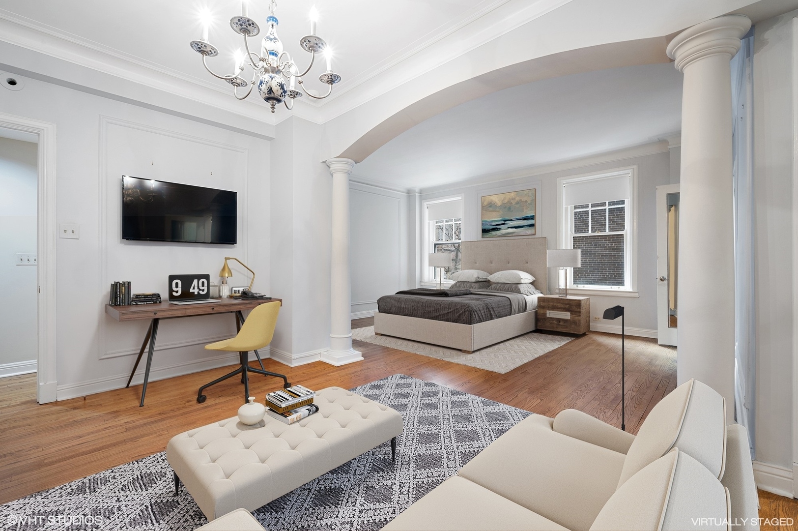 237 East Delaware Place, Unit 2A Chicago, IL 60611 - Photo 8 of 19 a living room with furniture a flat screen tv and a large window