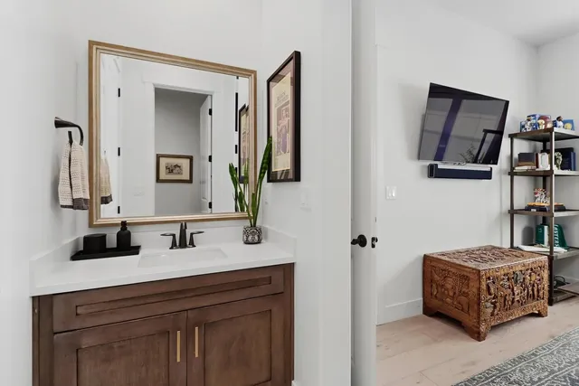 a bathroom with a bathtub and a sink