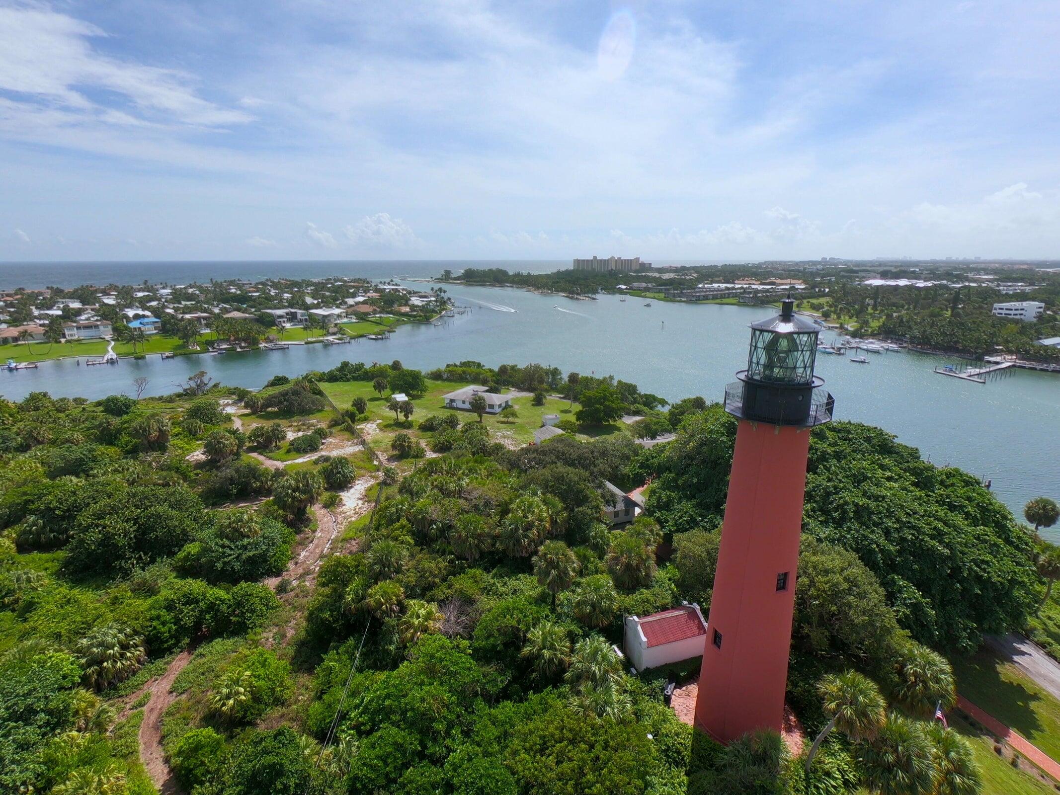 802 Muirfield Court, Unit 802A Jupiter, FL 33458 - Photo 25 of 25 an aerial view of a houses with outdoor space