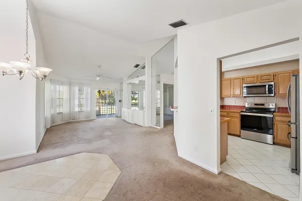 a view of a kitchen with a sink