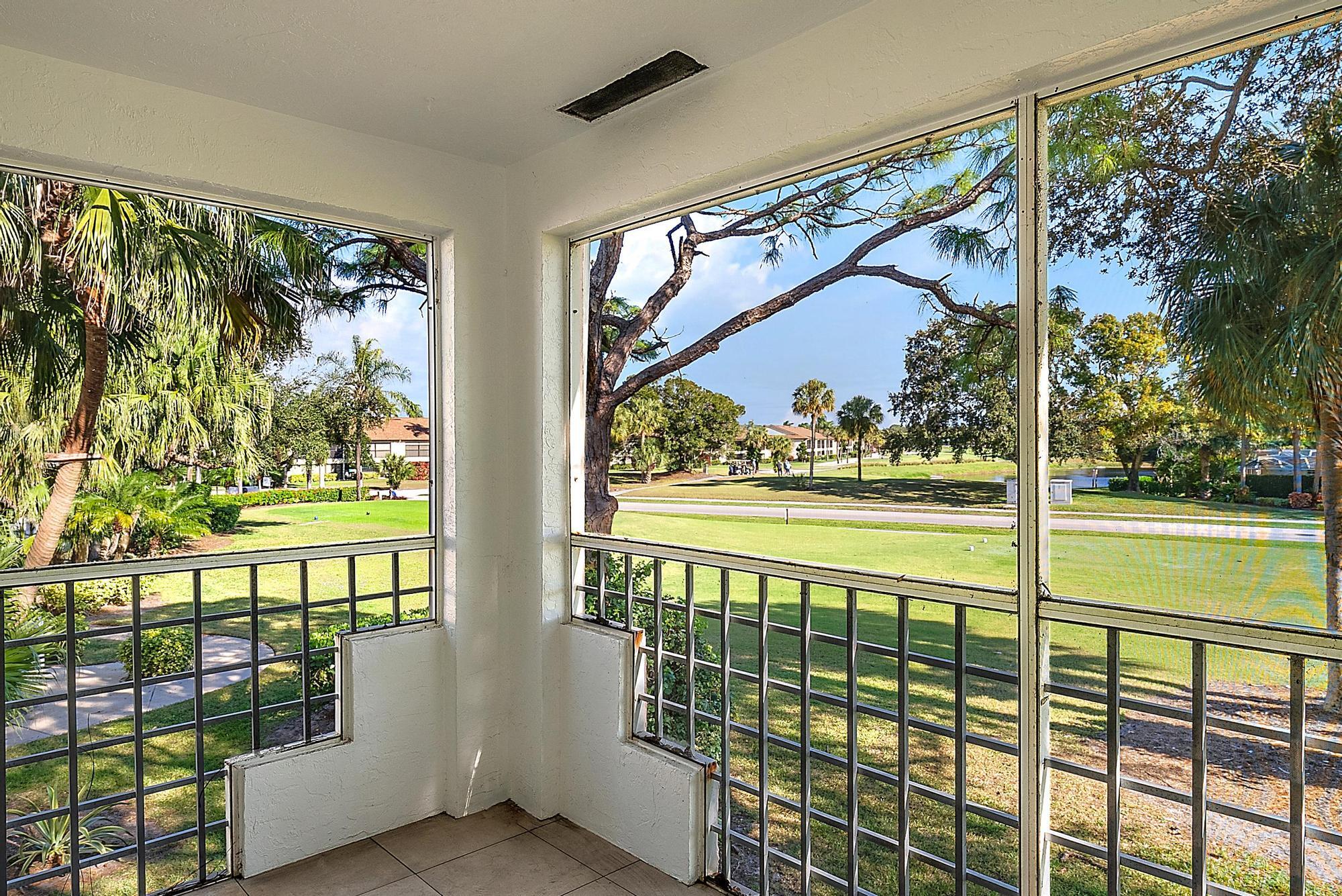 802 Muirfield Court, Unit 802A Jupiter, FL 33458 - Photo 10 of 25 a view of a city from a balcony