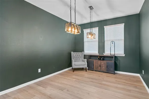 a room with window and wooden floor