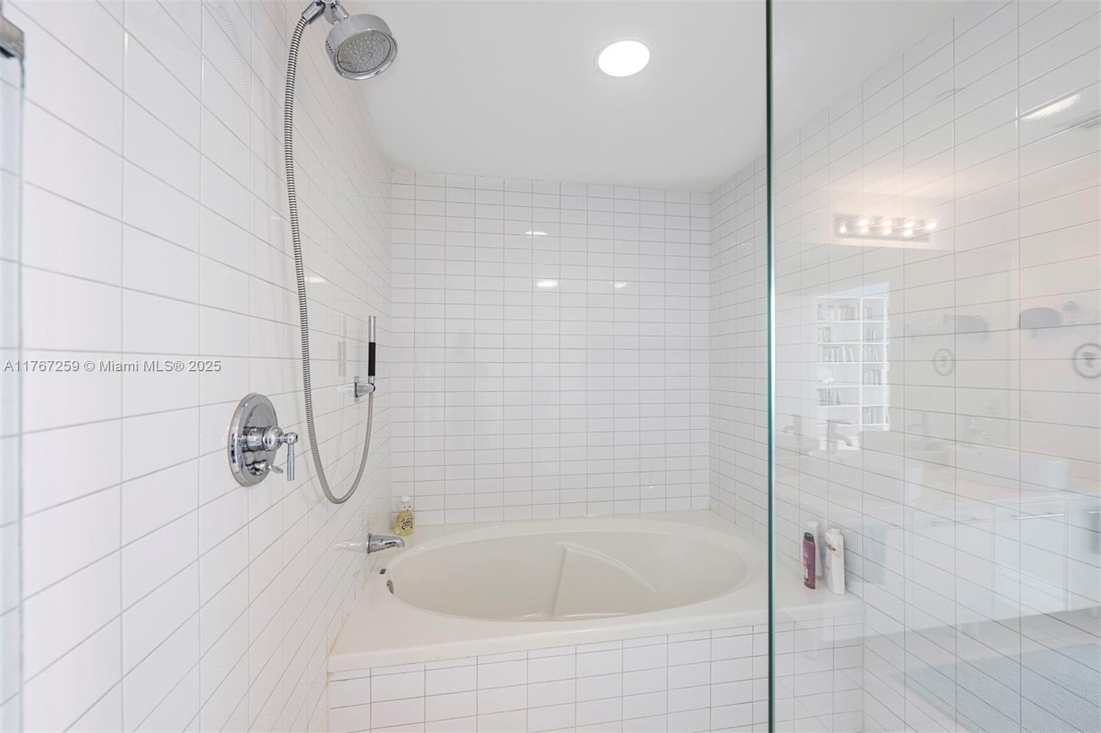 888 Biscayne Boulevard, Unit 4306 Miami, FL 33132 - Photo 7 of 70 a bathroom with a shower and a bathtub