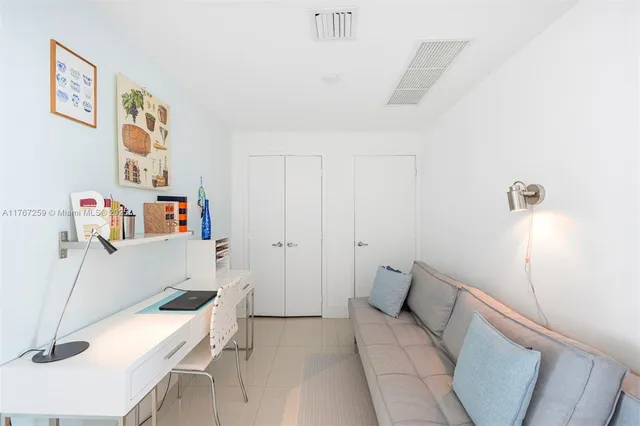 a view of a balcony next to a yard