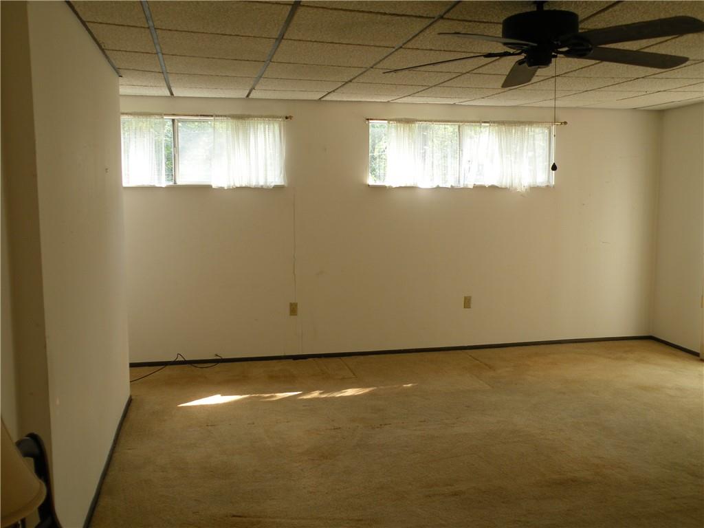 119 Upper Arrowhead Road Pittsburgh, PA 15237 - Photo 3 of 10 a view of an empty room with a window