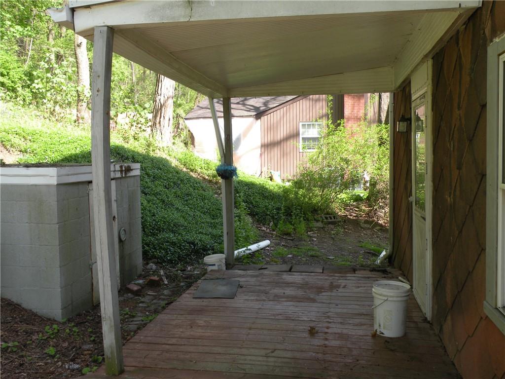119 Upper Arrowhead Road Pittsburgh, PA 15237 - Photo 10 of 10 a view of a porch with furniture and garden