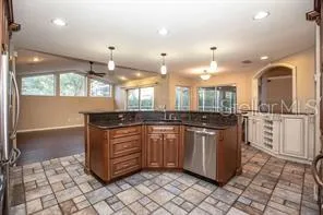 a bathroom with a sink a vanity and a mirror