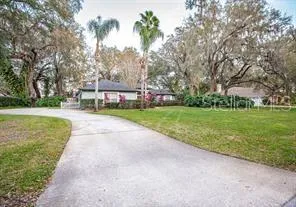 a house with garden in front of it