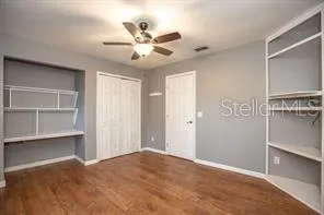 a view of a livingroom with a ceiling fan