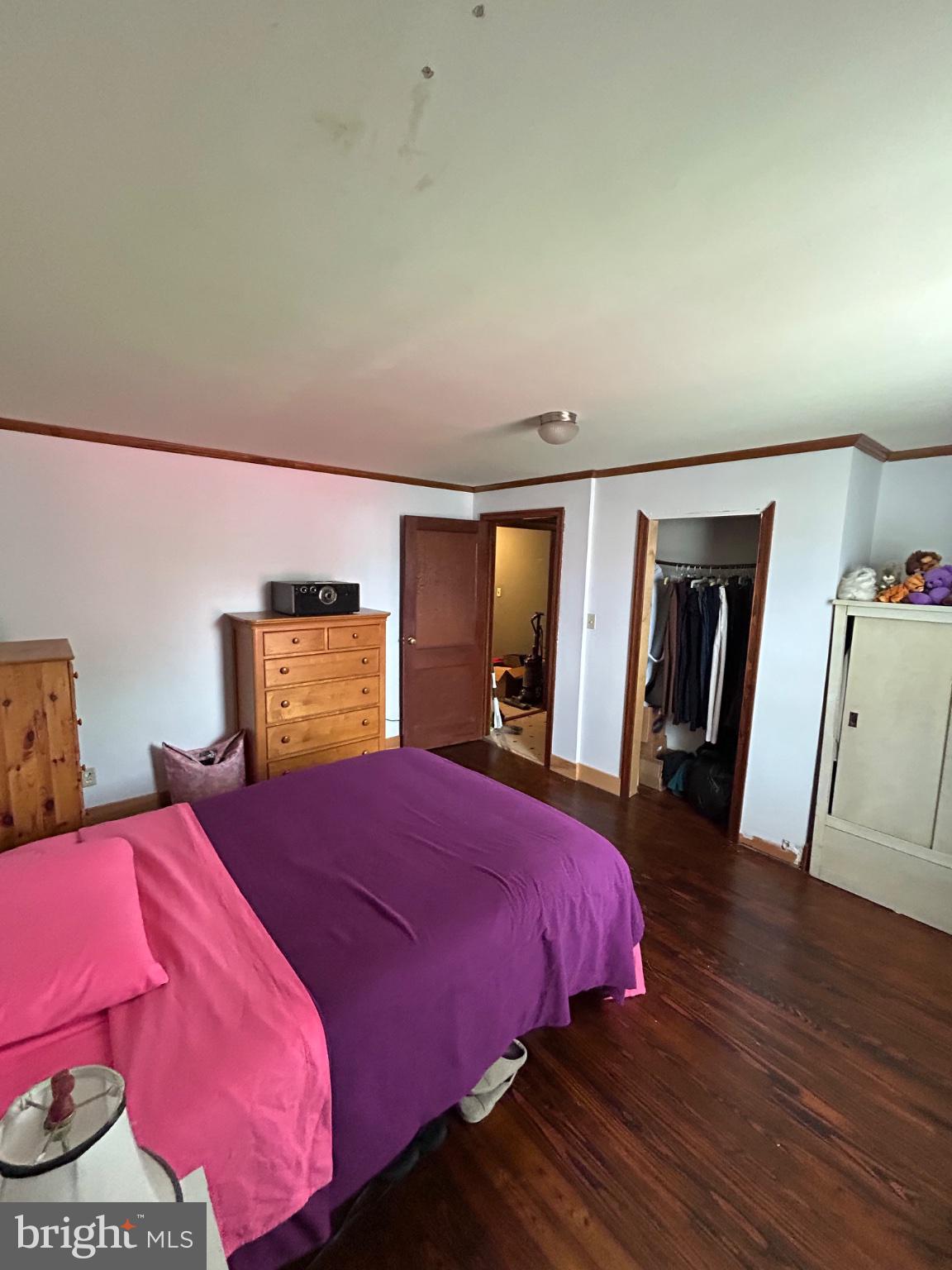 56 Maclay Street Milroy, PA 17063 - Photo 17 of 36 Cozy bedroom with vibrant accents.