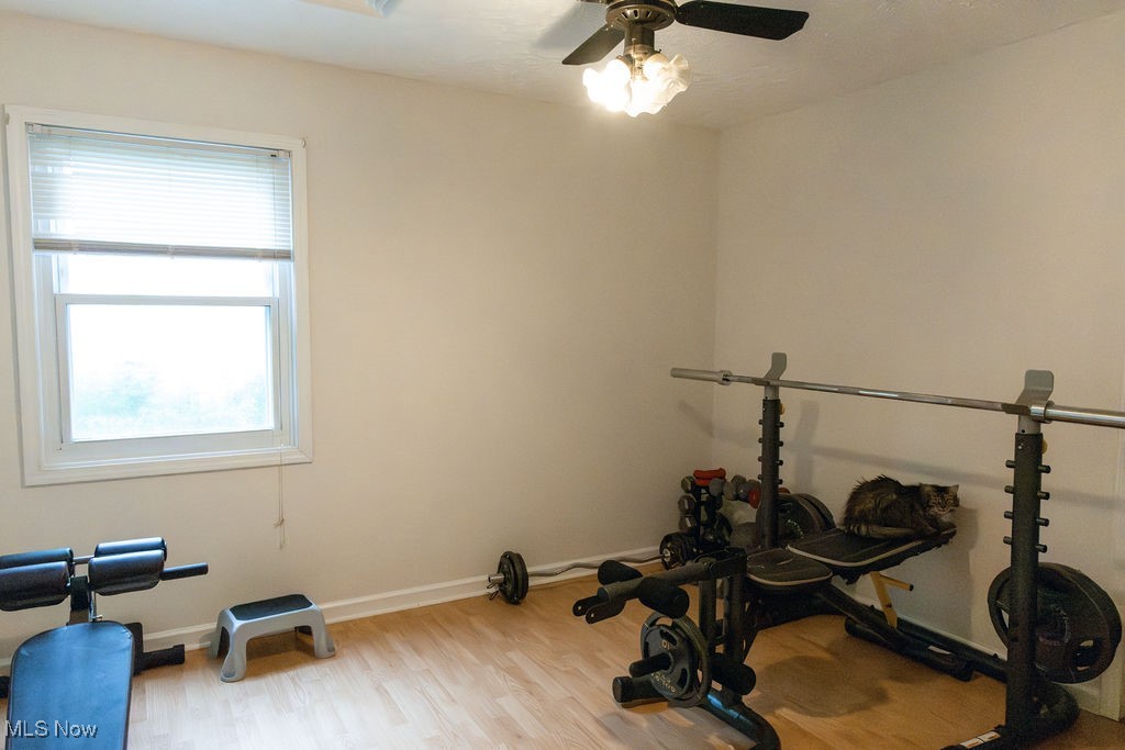1995 Benjamin Road Madison, OH 44057 - Photo 27 of 50 Workout room with a ceiling fan and wood finished floors