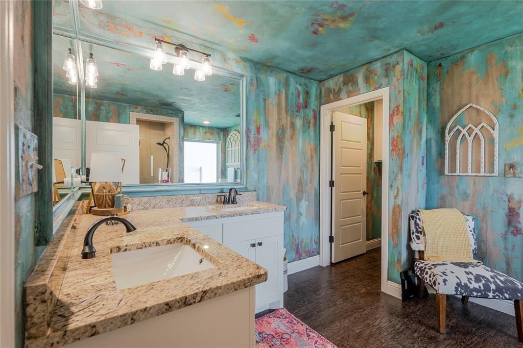 470 Wilson Bend Road Millsap, TX 76066 - Photo 18 of 39 a bathroom with a sink and a mirror
