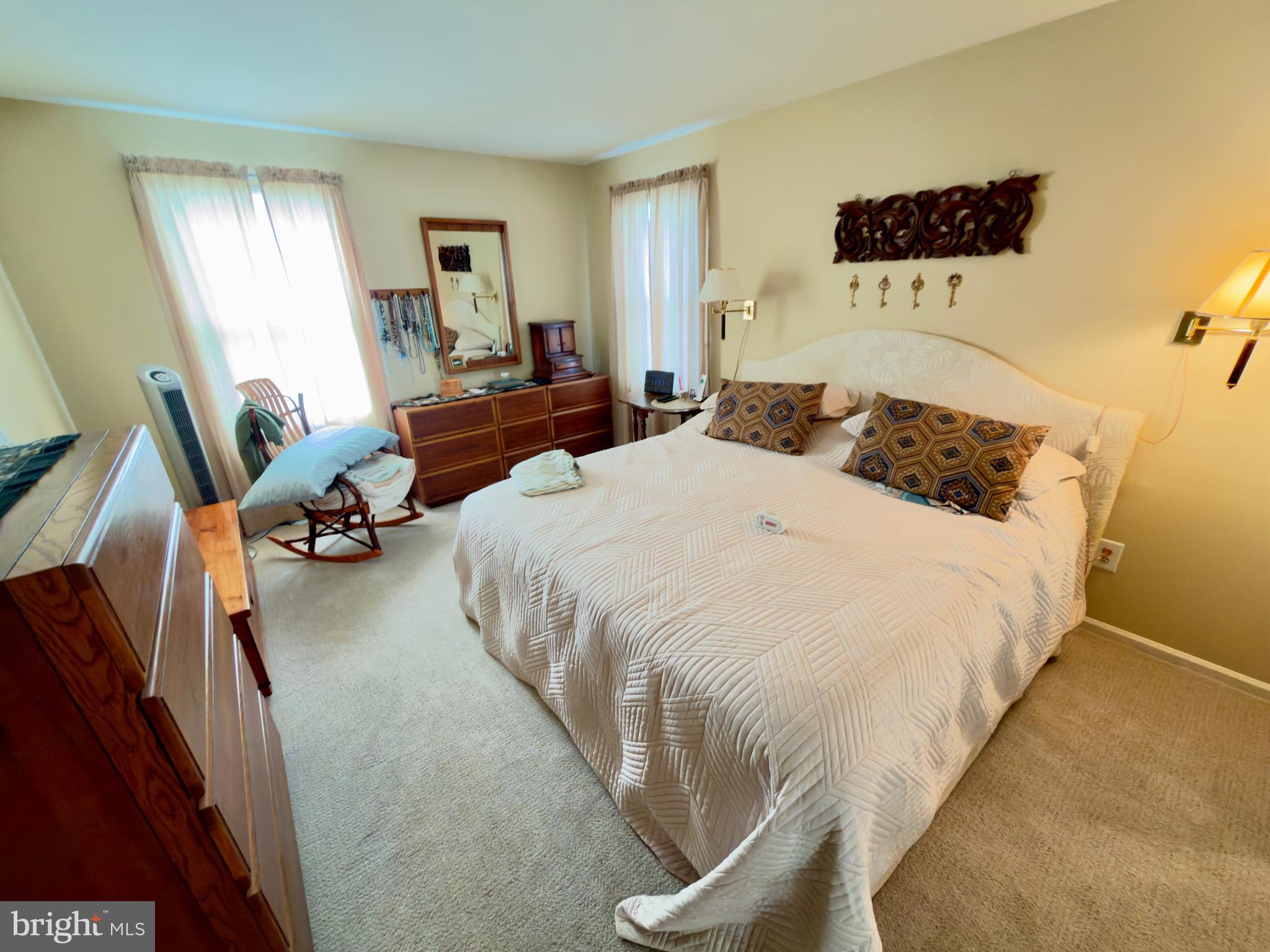 2548 Nashua Road Bensalem, PA 19020 - Photo 14 of 15 a bedroom with a bed and wooden floor