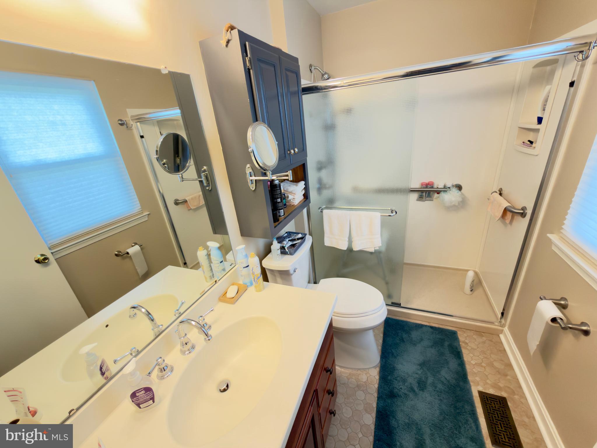 2548 Nashua Road Bensalem, PA 19020 - Photo 7 of 15 a bathroom with a sink mirror vanity and toilet