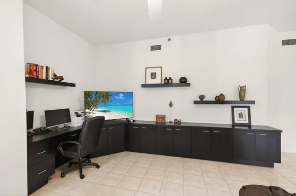 a bathroom with a sink a large mirror and shower