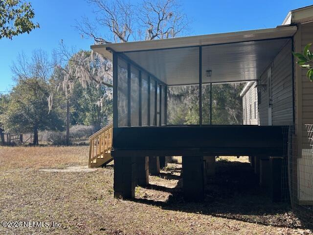 788 Keuka Road Hawthorne, FL 32640 - Photo 31 of 45 788 keuka rear of home screen patio