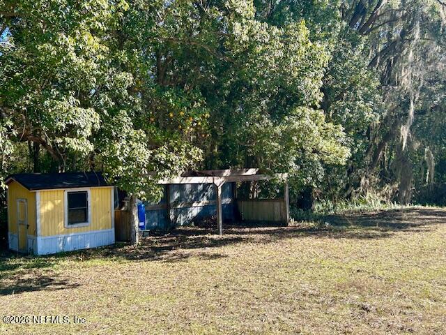788 Keuka Road Hawthorne, FL 32640 - Photo 44 of 45 788 keuka rear yard and chicken coop