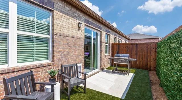 a view of a backyard with plants