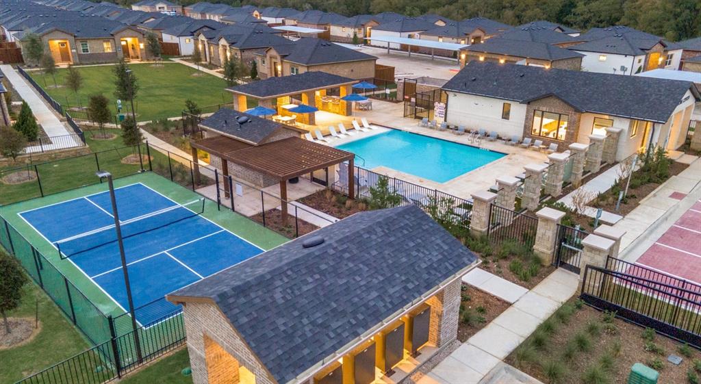 3950 Dechman Drive, Unit 2015 Grand Prairie, TX 75052 - Photo 2 of 27 an aerial view of a house with a yard